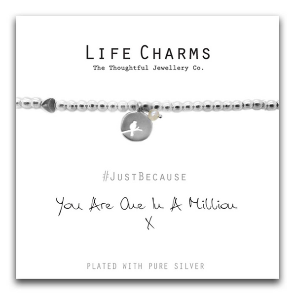 Silver plated beaded bracelet on a white Life Charms Card. Reading #justbecause You are one in a million